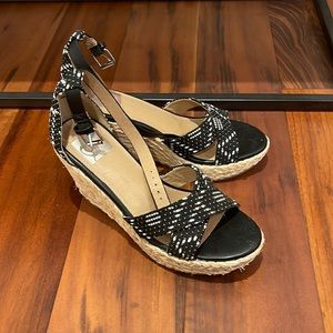 Black, white and straw ankle strap wedges
